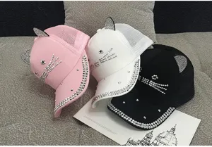 Close-up of cute cat ear mesh baseball caps with sparkly rhinestone designs