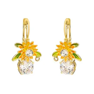 Close-up of pastoral sunflower earrings with sparkling rhinestones and enamel petals