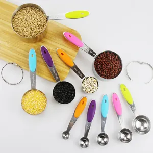 Close-up view of 10-piece stainless steel measuring cup and spoon set with colored handles