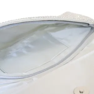 Elegant silver rhinestone evening clutch bag with zipper pocket for women party events.
