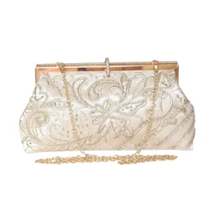 Floral embroidered evening clutch bag, vintage sequin metal frame with chain strap.