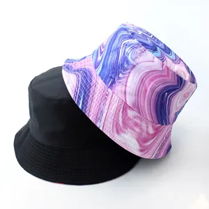 Reversible bucket hat for men and women, trendy casual sun protection summer hat with marble pattern.