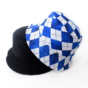 Detail shot of reversible bucket hats showing solid black and blue-white checkered patterns
