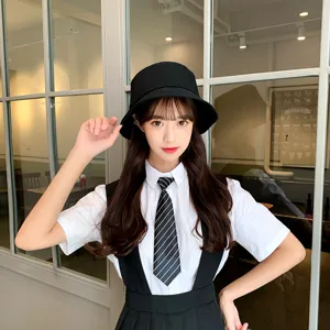 Asian female model showcasing a minimalist black Japanese style bucket hat for sun protection