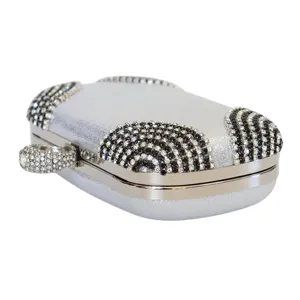 Elegant silver evening clutch bag with sparkling diamond accents for party banquets