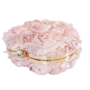 Elegant pink heart-shaped evening clutch bag with 3D satin rose flower design
