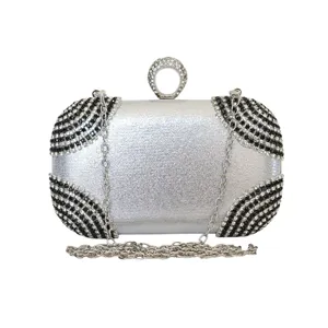 Elegant silver rhinestone evening clutch bag with black stripe accents and ring clasp.