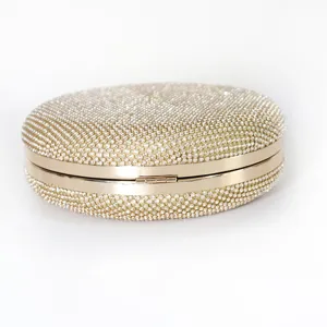 Sparkling rhinestone round evening clutch bag with gold metal frame for women party wedding.