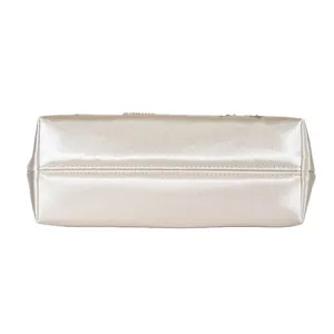Bottom view of an elegant champagne evening clutch bag with metallic satin finish