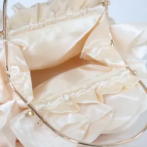 Elegant cream satin flower petal evening clutch bag with gold handle
