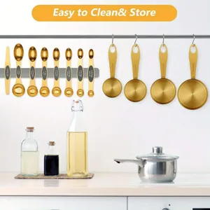Gold stainless steel measuring spoons and cups set for kitchen baking and cooking use