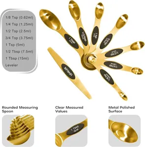 Gold stainless steel measuring spoons set with clear engraved measurements for baking and cooking.