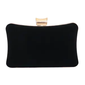 Elegant black velvet evening clutch bag with sparkling rhinestone studded gold clasp