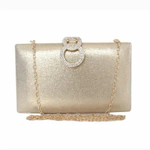 Elegant gold glitter evening clutch bag featuring rhinestone double-ring clasp and chain strap