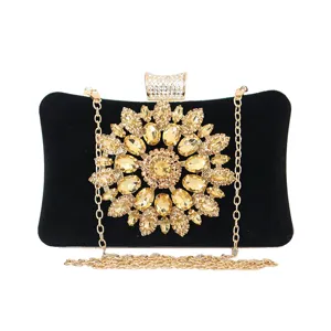 Elegant black suede evening clutch bag with golden rhinestone sunflower decoration