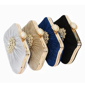 Elegant pleated evening clutch bags with rhinestone clasps in four classic colors.