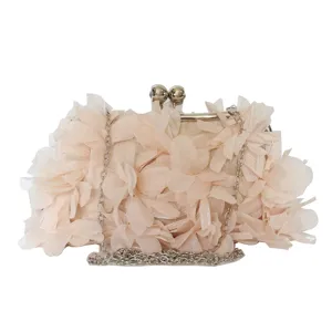 Elegant champagne floral clutch bag with fabric petals and metal chain strap