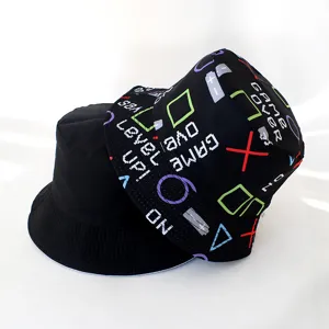 Reversible black bucket hat with fun gaming pixel pattern detail, casual sun protection style.