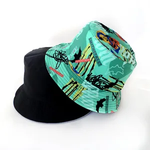 Reversible bucket hat with stylish graffiti print and solid black design for men and women sun protection.
