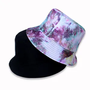 Reversible tie-dye and black bucket hat for men and women, stylish sun protection cap.