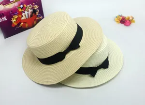 Classic straw boater hat for women, elegant flat top sun hat with black bow ribbon.