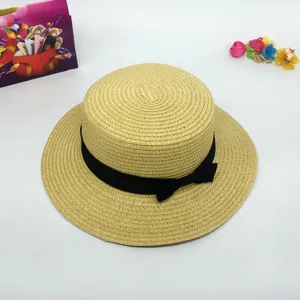Women summer flat top straw hat with black ribbon bow, elegant beach sun hat main view.
