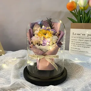 Elegant LED lit sunflower and rose soap flower bouquet in a glass dome gift display