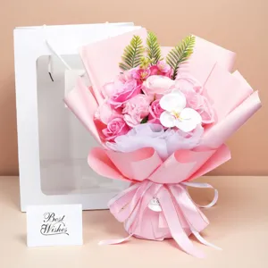 Artificial soap flower bouquet with roses, carnations and gift bag, perfect for Valentine's Day.