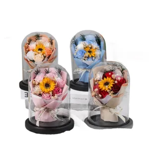 Artificial soap flower bouquet in large glass dome with LED night light function