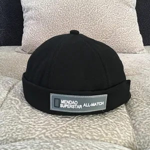 Black docker hat miki hat retro streetwear cap with front text patch detail casual stylish