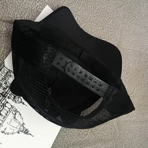 Cute black trucker hat with cat ears and adjustable snapback closure for women