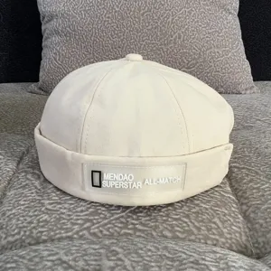 Beige cotton dockermaker hat for men and women, spring summer retro hip-hop beanie cap.