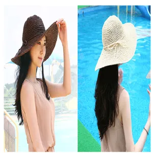 Womens wide brim straw sun hats for beach vacations in coffee and cream colors