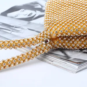 Elegant gold rhinestone evening clutch bag with full crystal embellishment for parties