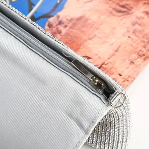 Silver rhinestone evening bag for women, sparkling crystal clutch purse for party and wedding.