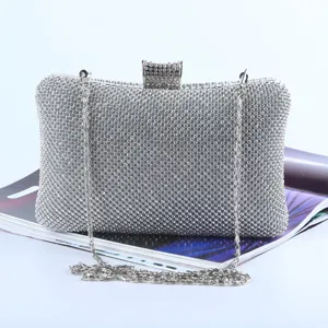 Silver rhinestone evening clutch bag with metal chain strap for women party dresses.