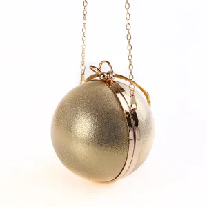 Elegant golden spherical evening clutch bag with chain strap and metallic finish