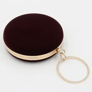 Elegante burgunderfarbene Samt-Abendtasche mit rundem Strassgriff für Bankette.