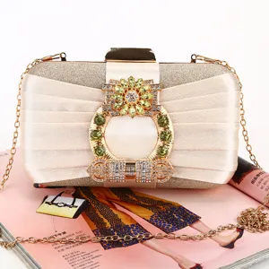Elegant champagne pleated evening clutch bag with sparkling rhinestone floral buckle