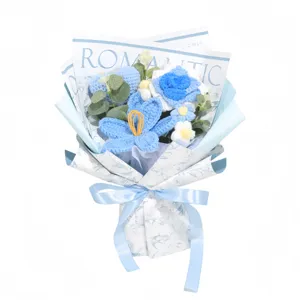 Handmade blue crochet flower bouquet with romantic wrapping for Valentine's Day gift.
