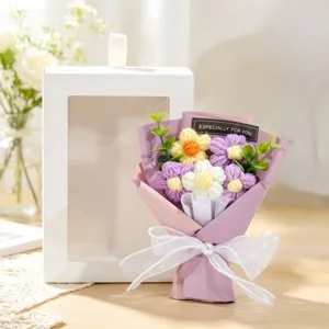 Handmade knitted purple and white flower bouquet presented with elegant white gift box set