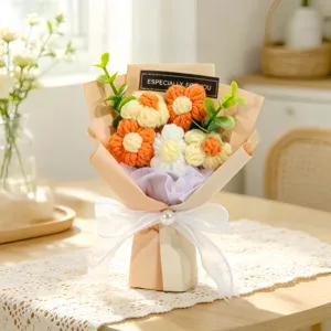 Detailed close-up of a handmade knitted yarn flower bouquet with decorative gift tag