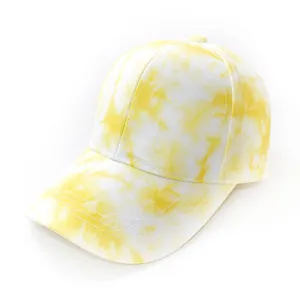 Yellow tie dye baseball cap detail view, summer sun protection casual streetwear hat close up.