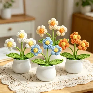 Detailed macro view of handmade crochet flower pots with colorful woolen blossoms
