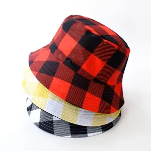 Stacked colorful checkered bucket hats for men and women in street style.
