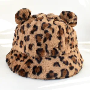 Close-up detail of the plush leopard print fabric and cute bear ears on winter hat
