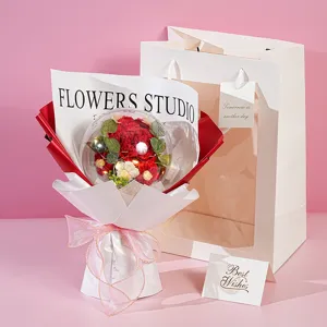 Handmade crochet rose flower bouquet detail with glowing lights inside transparent bobo balloon.