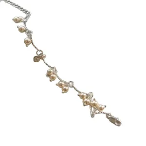 Elegante pulsera de cadena de plata de estilo francés con perlas champán colgantes