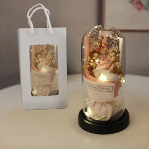 Eternal rose glass dome gift with led lights and gift bag for romantic occasions.