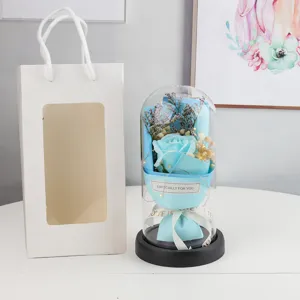 Blue eternal rose in glass dome with gift bag, romantic gift for Valentine Day.